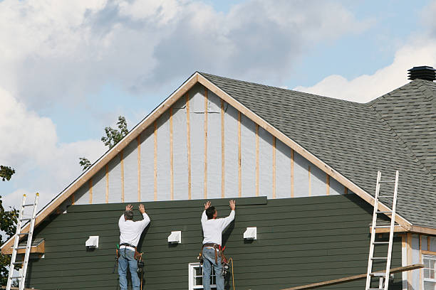 Professional Emergency Siding Repair technician working in Columbia, VA